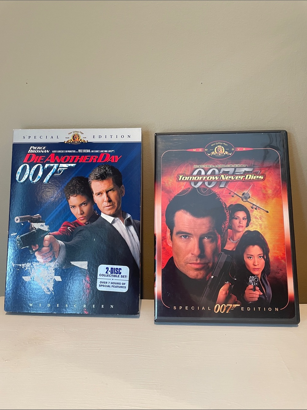 Two DVDs of 007 with pierce Brosnan